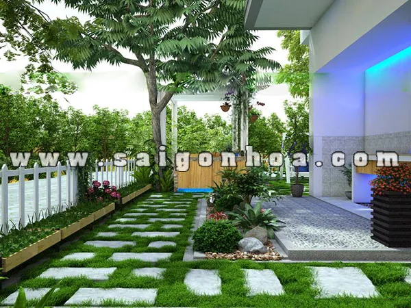 Hình ảnh tiểu cảnh sân vườn nhà phố được thiết kế với cây xanh và cảnh quan nước